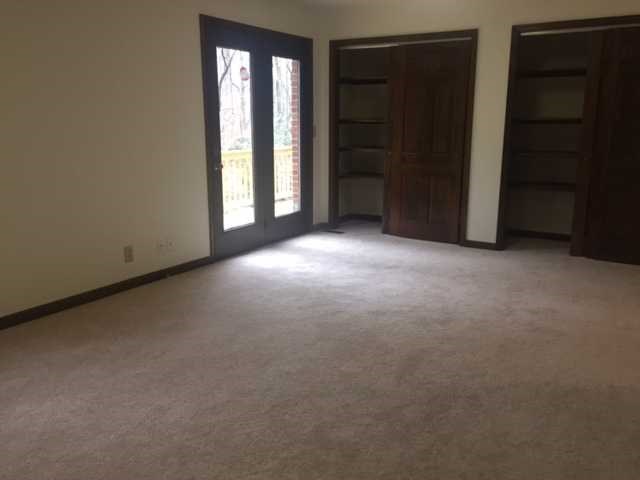 6875 Colaparchee Road, Unit 5A Macon, GA 31210 - Photo 24 of 39 an empty room with windows and closet