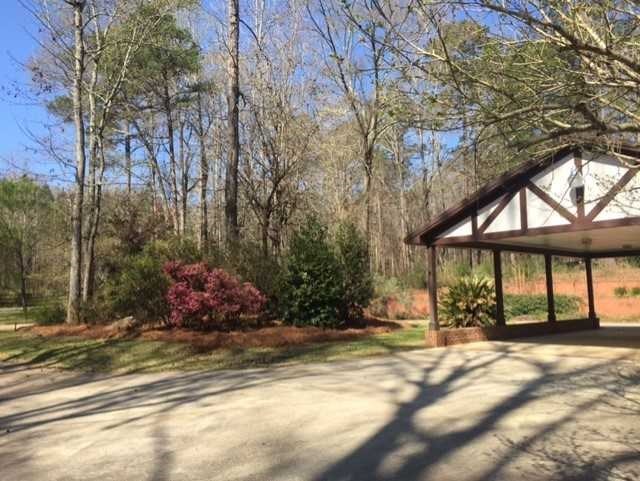 6875 Colaparchee Road, Unit 5A Macon, GA 31210 - Photo 26 of 39 a view of a house with a yard
