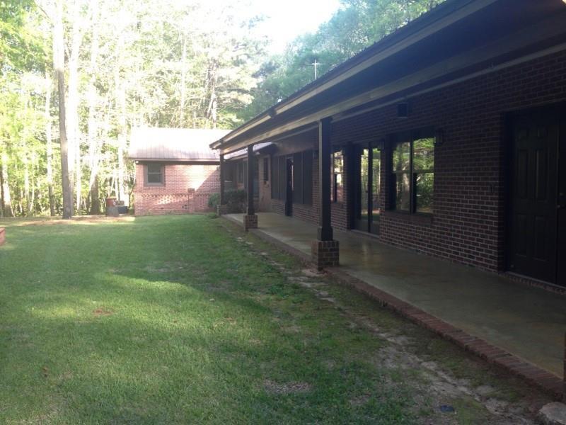 6875 Colaparchee Road, Unit 5A Macon, GA 31210 - Photo 31 of 39 a view of a house with a yard