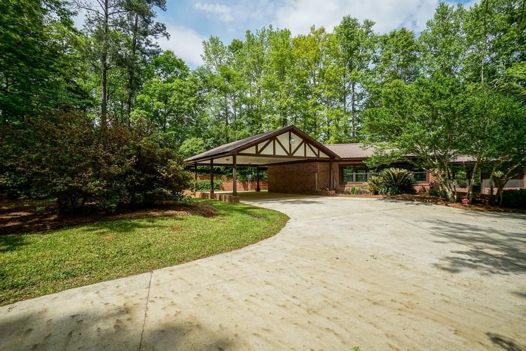 6875 Colaparchee Road, Unit 5A Macon, GA 31210 - Photo 34 of 39 a front view of a house with a yard