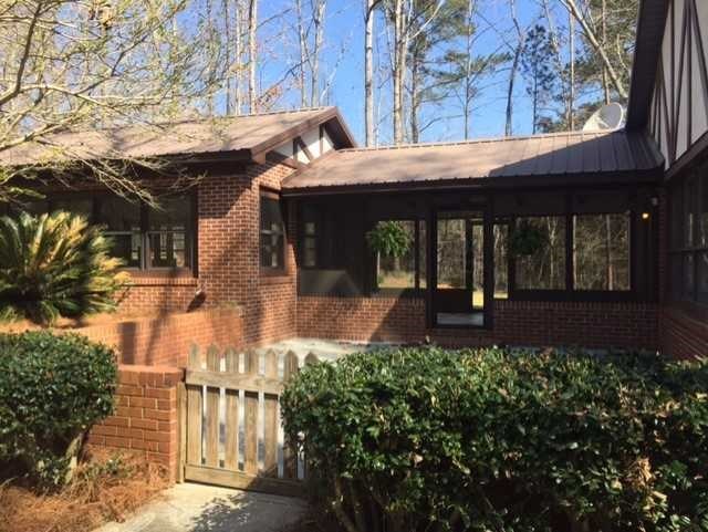 6875 Colaparchee Road, Unit 5A Macon, GA 31210 - Photo 35 of 39 a front view of a building with a garden