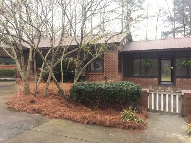 6875 Colaparchee Road, Unit 5A Macon, GA 31210 - Photo 36 of 39 front view of house with a yard