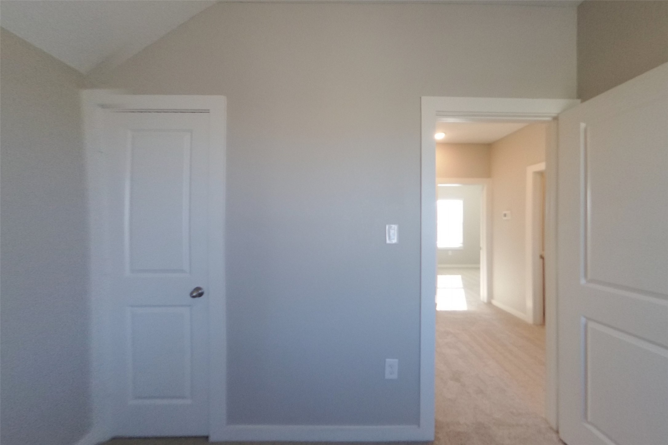 508 Raglands Road Leander, TX 78641 - Photo 10 of 18 Vaulted ceilings and neutral tones frame the transition between comfortable living spaces.