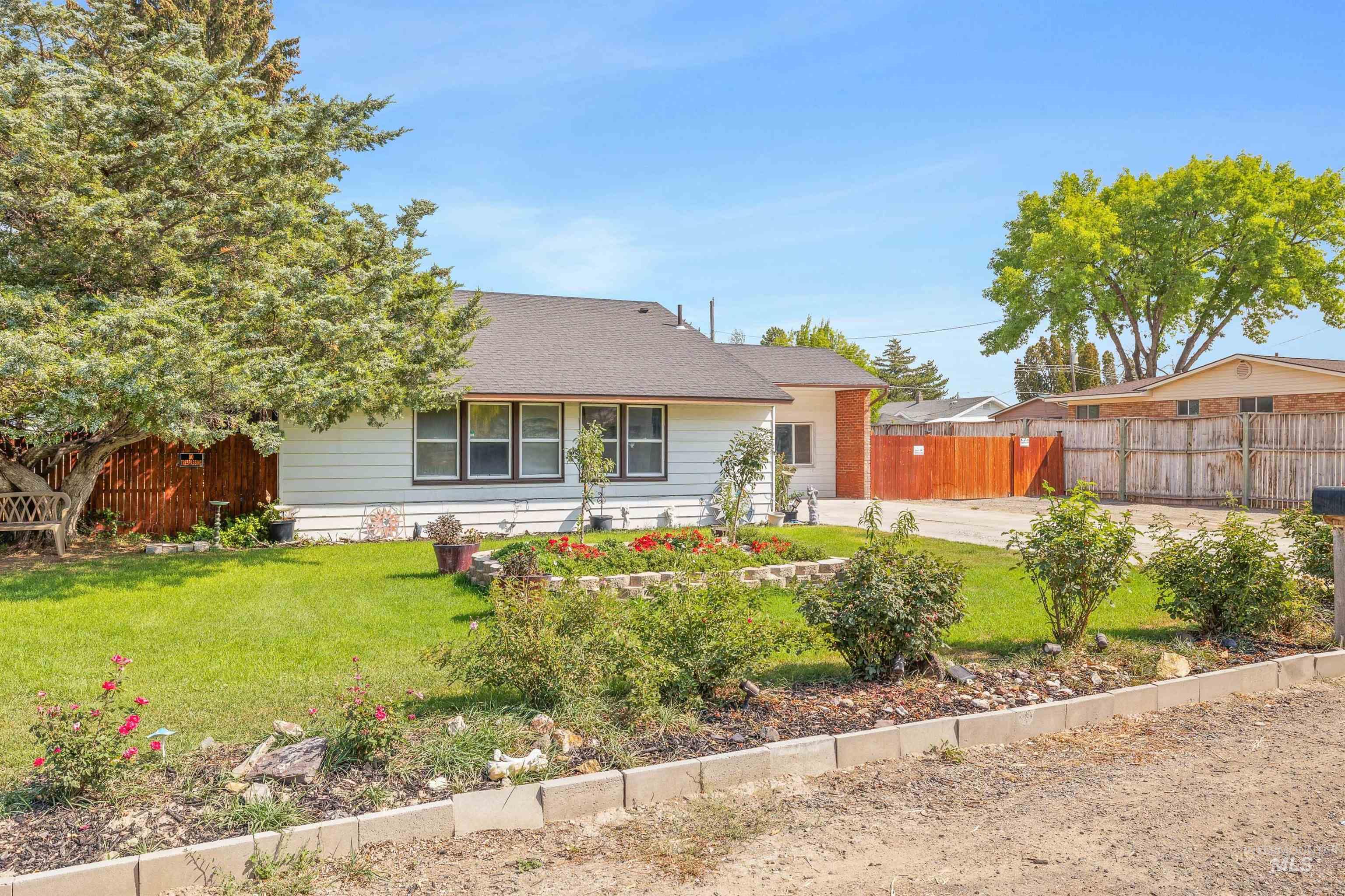 817 Union Avenue Filer, ID 83328 - Photo 29 of 37 Rear view of house with a shingled roof