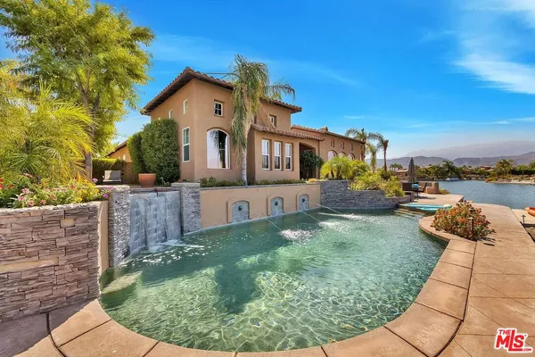 a view of a house with a yard balcony