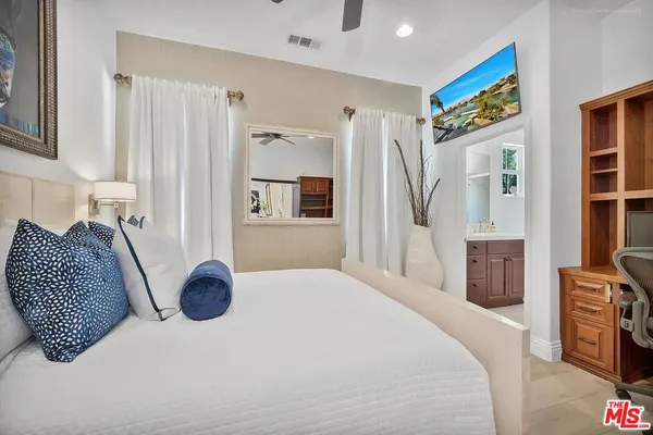 a utility room with sink dryer and washer