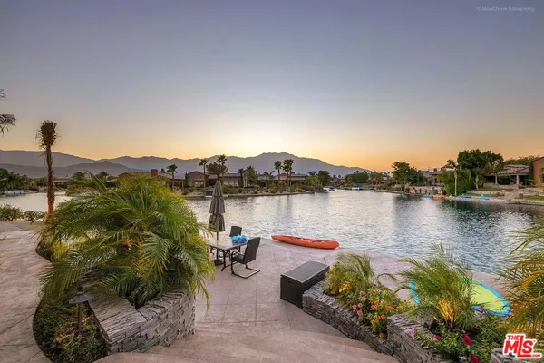 a bedroom with furniture and a fireplace