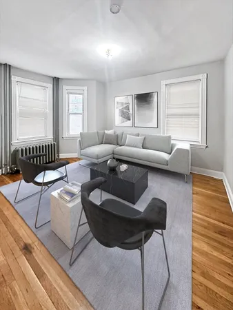 a living room with furniture and a couch