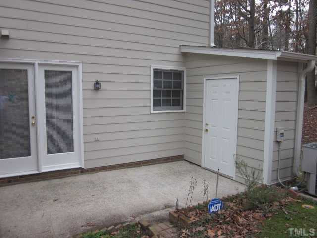 701 Charleston Road Raleigh, NC 27606 - Photo 3 of 25 Private patio with french door entry to dining room! Storage off of patio as well! Patio/Deck