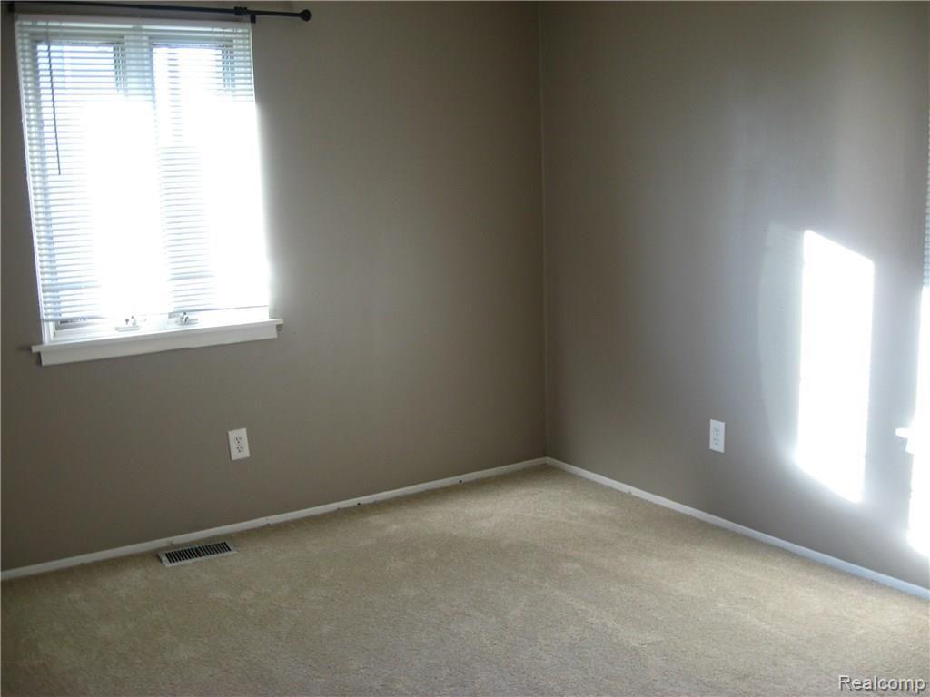 9155 Rucker Road Grosse Ile, MI 48138 - Photo 24 of 31 Bedroom 3