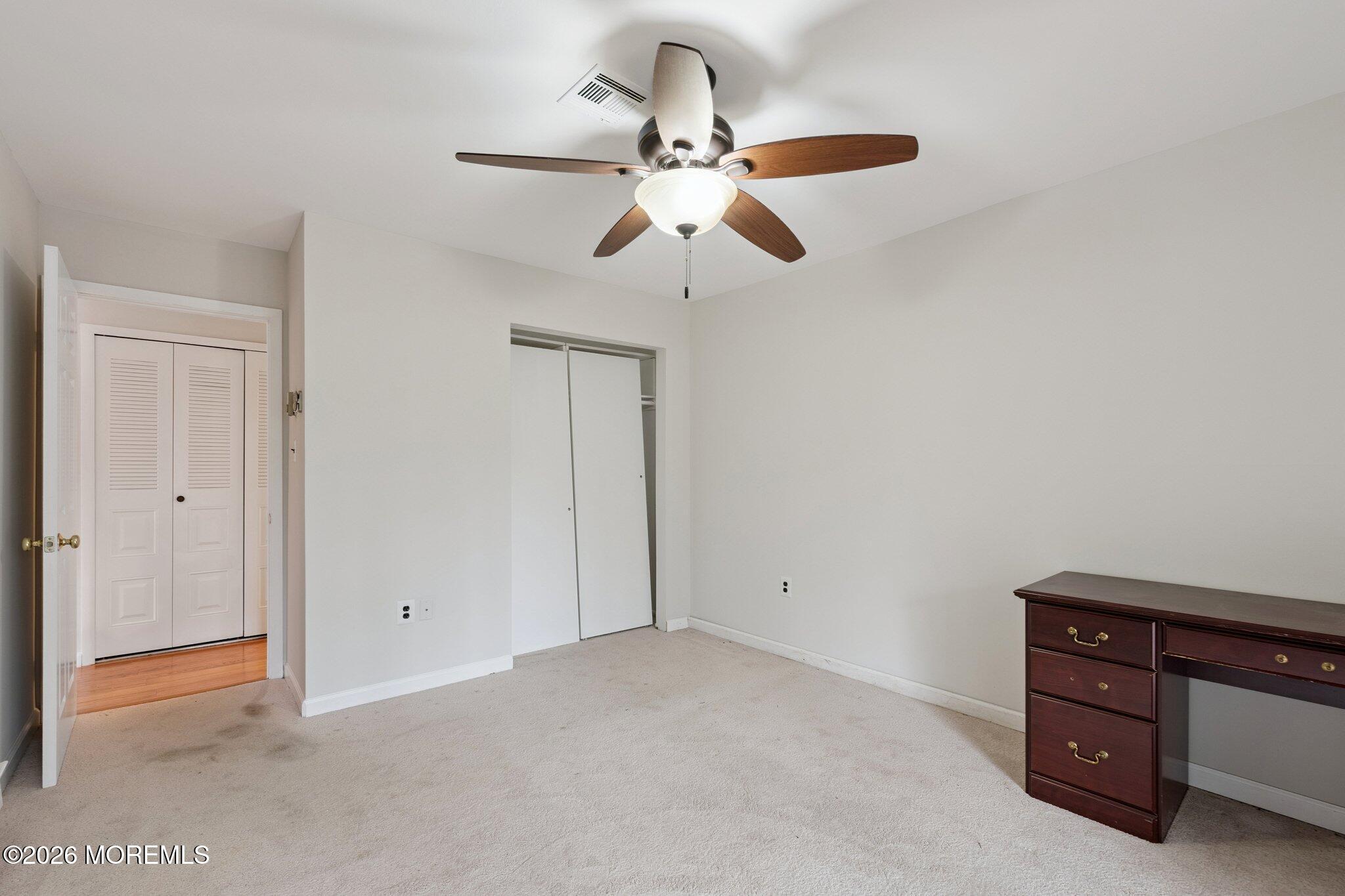 102 Arrowood Road, Unit B Manalapan, NJ 07726 - Photo 32 of 41 a view of an empty room