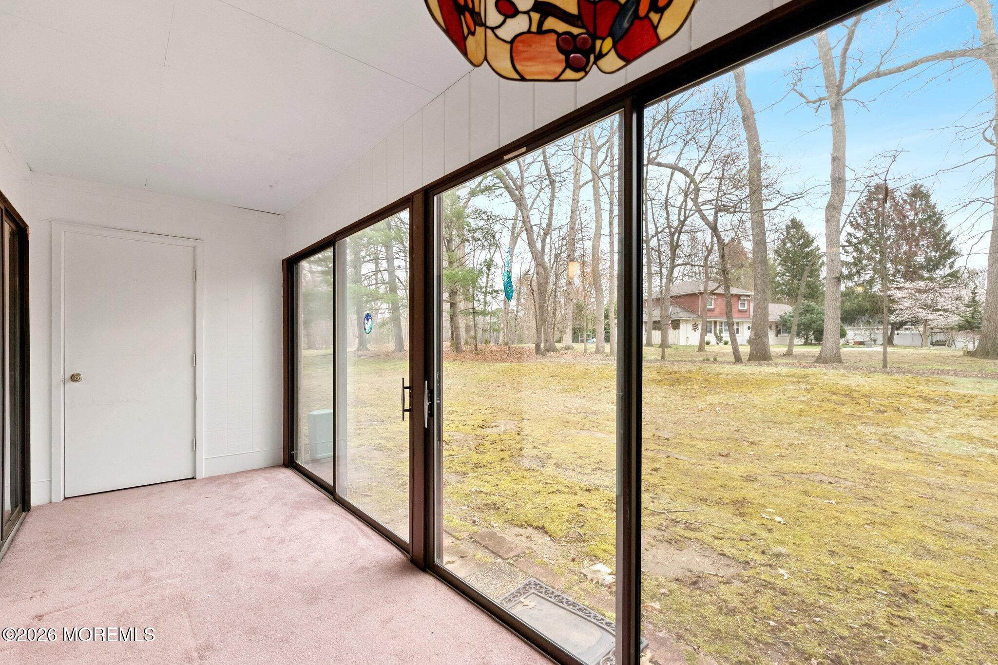 102 Arrowood Road, Unit B Manalapan, NJ 07726 - Photo 40 of 41 a view of a room with an empty room