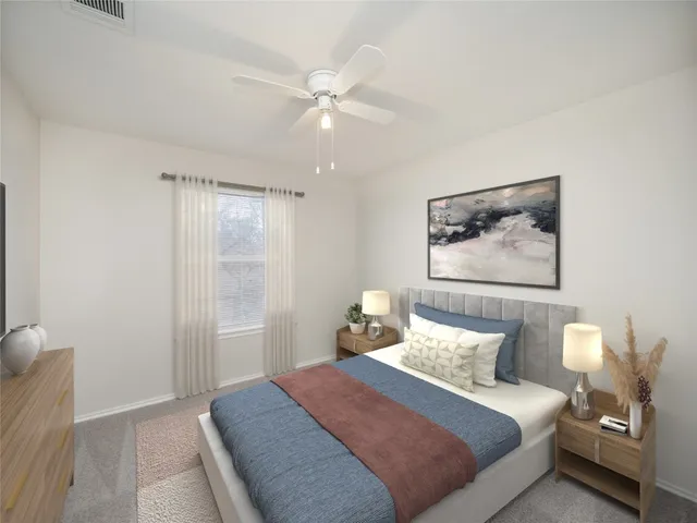 a living room with furniture and flat screen tv