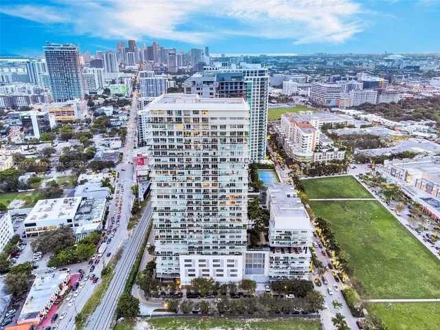 a view of a city with tall buildings