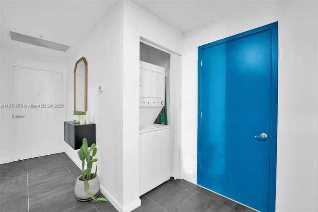 a view of a hallway with potted plant