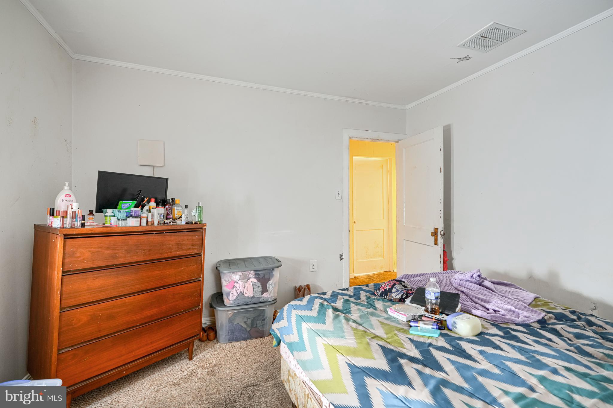 502 Grovethorn Road Middle River, MD 21220 - Photo 11 of 20 a bedroom with a bed and a window