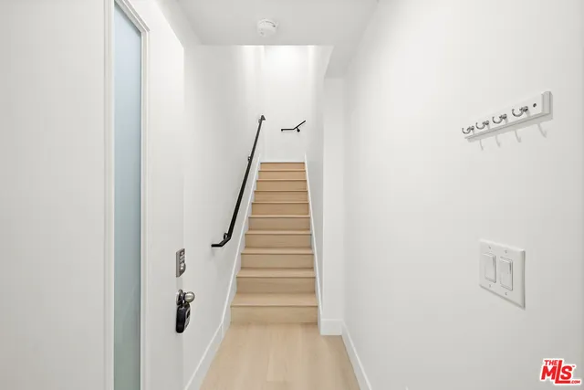 a view of entryway with stairs