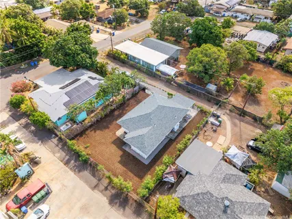 an aerial view of residential house with outdoor space