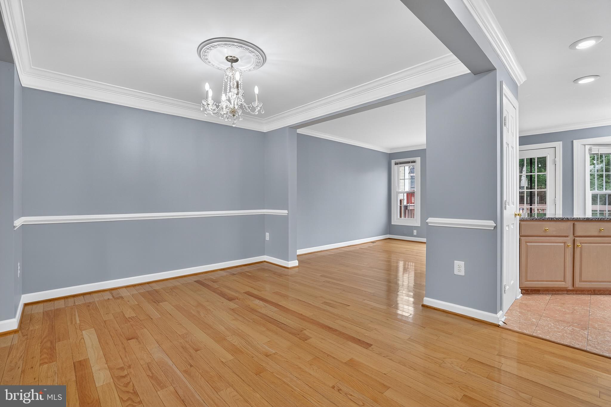 6319 Powder Flask Court Centreville, VA 20121 - Photo 15 of 31 a view of an empty room with chandelier