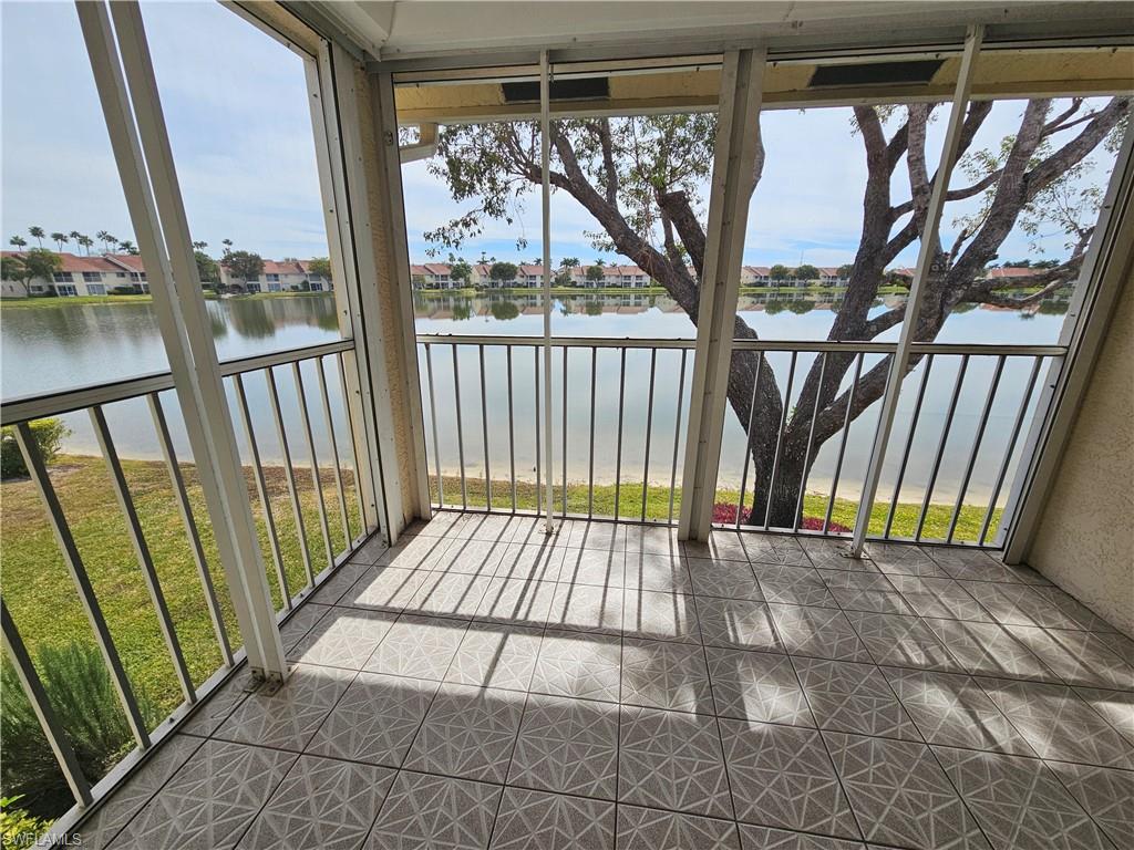 7766 Emerald Circle, Unit R201 Naples, FL 34109 - Photo 2 of 35 a view of front door