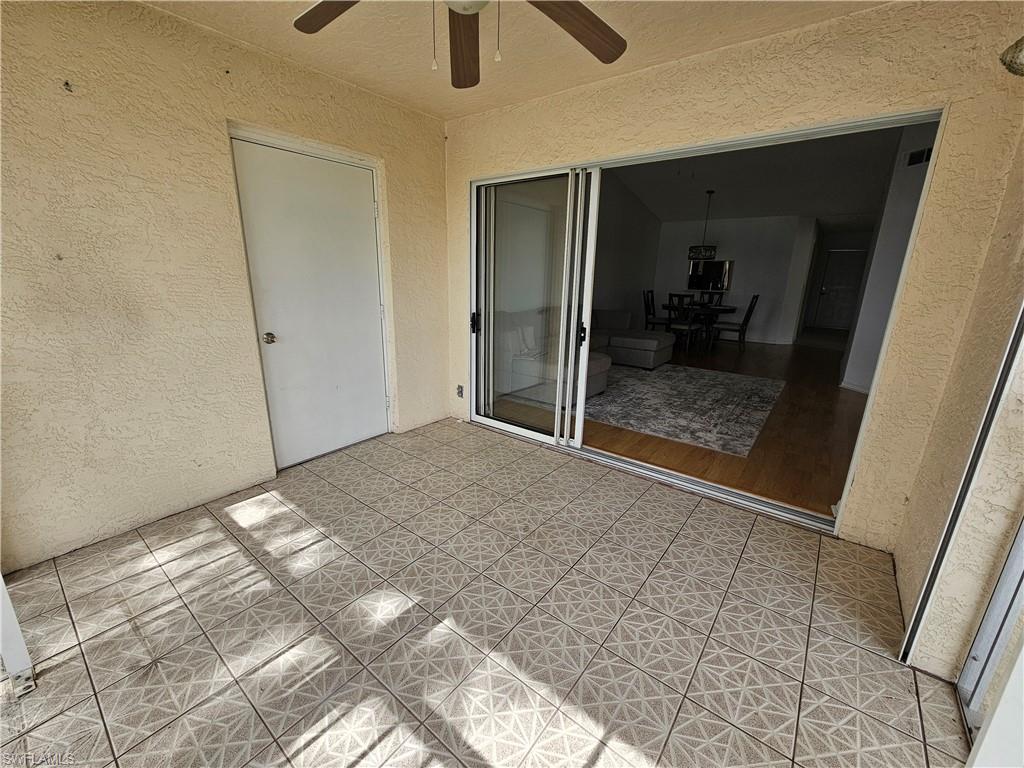 7766 Emerald Circle, Unit R201 Naples, FL 34109 - Photo 23 of 35 a view of livingroom with natural light