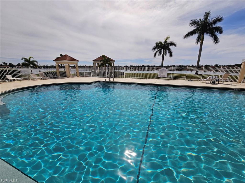 7766 Emerald Circle, Unit R201 Naples, FL 34109 - Photo 27 of 35 a view of a water closet and an ocean view