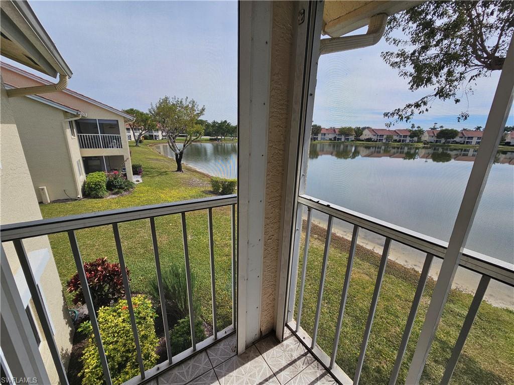 7766 Emerald Circle, Unit R201 Naples, FL 34109 - Photo 3 of 35 a view of balcony with a potted plant
