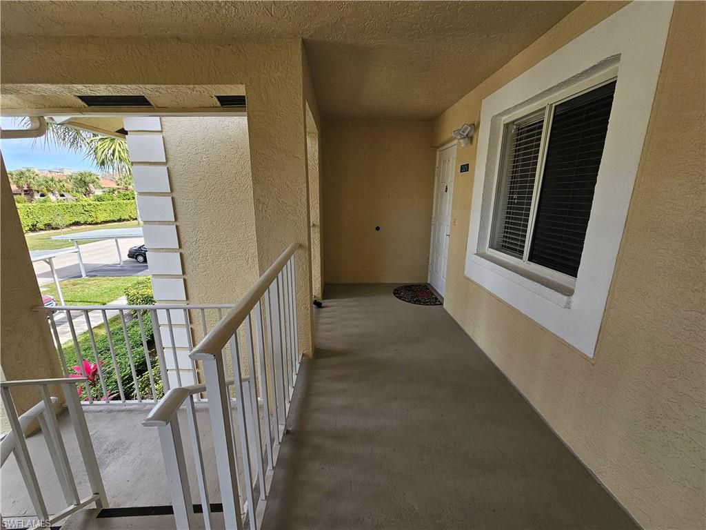 7766 Emerald Circle, Unit R201 Naples, FL 34109 - Photo 5 of 35 a view of entryway with interior