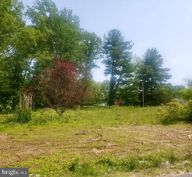 2611 Hoffman Mill Road Hampstead, MD 21074 - Photo 3 of 5 a view of a field with an trees