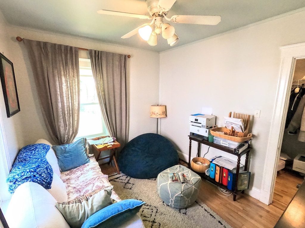12 Searle Road, Unit 12 Boston, MA 02132 - Photo 22 of 35 a living room with furniture and a window