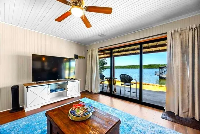 a view of a swimming pool with a bench in a patio