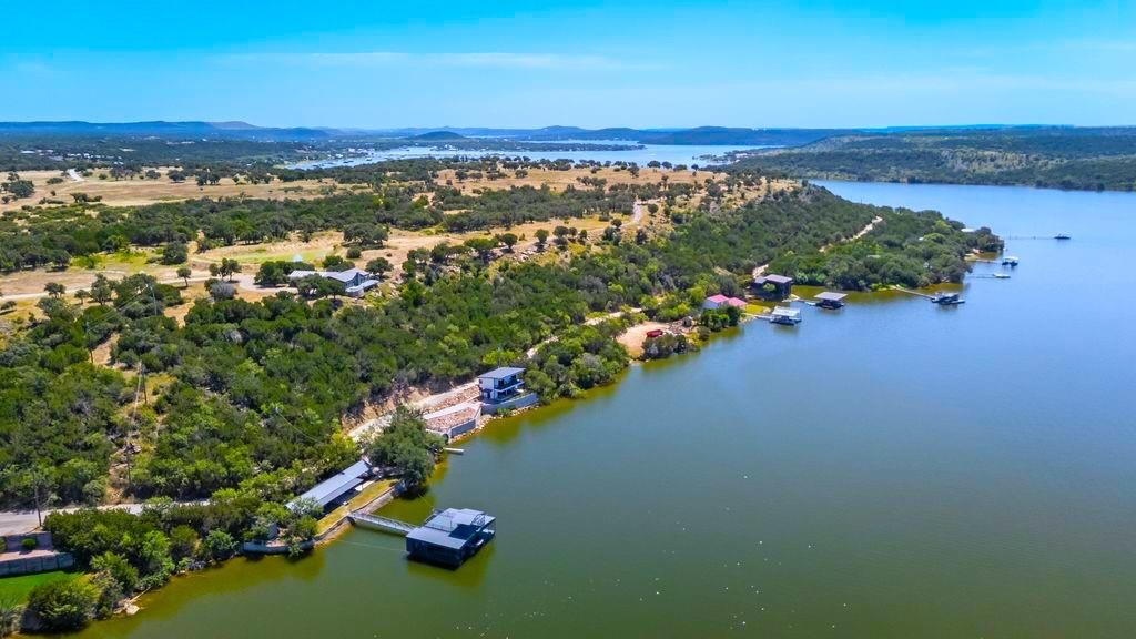 8301 County Road 300 Graham, TX 76450 - Photo 5 of 40 an aerial view of a houses with a lake view