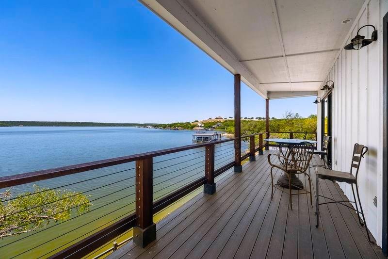 8301 County Road 300 Graham, TX 76450 - Photo 10 of 40 a view of a balcony with chairs