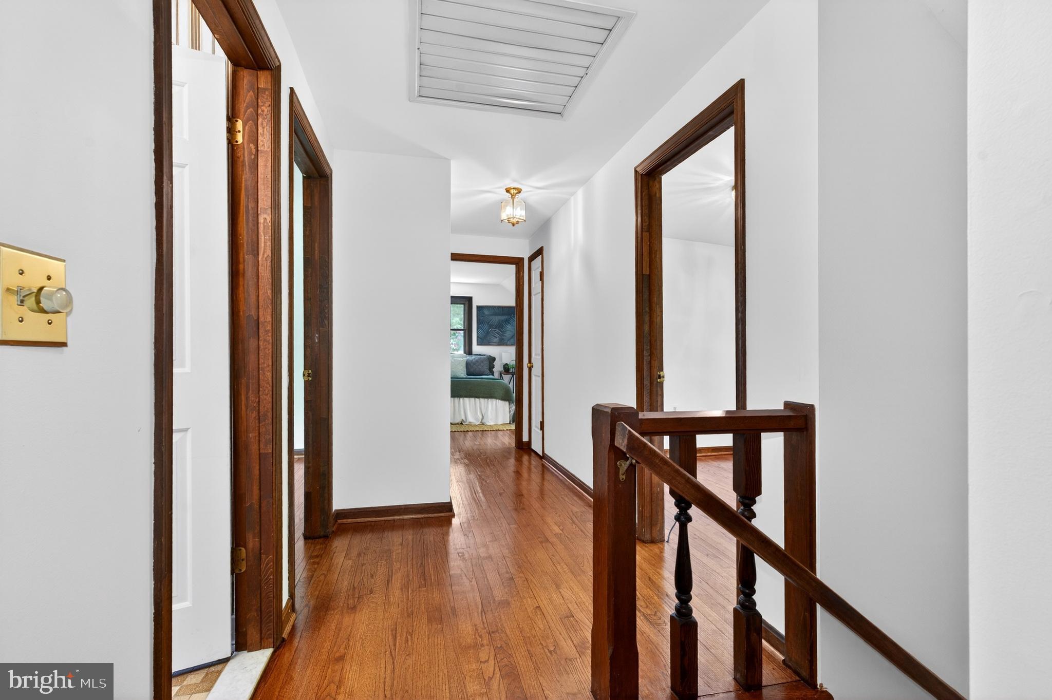 17201 Whiteley Road Monkton, MD 21111 - Photo 21 of 47 a view of hallway with wooden floor