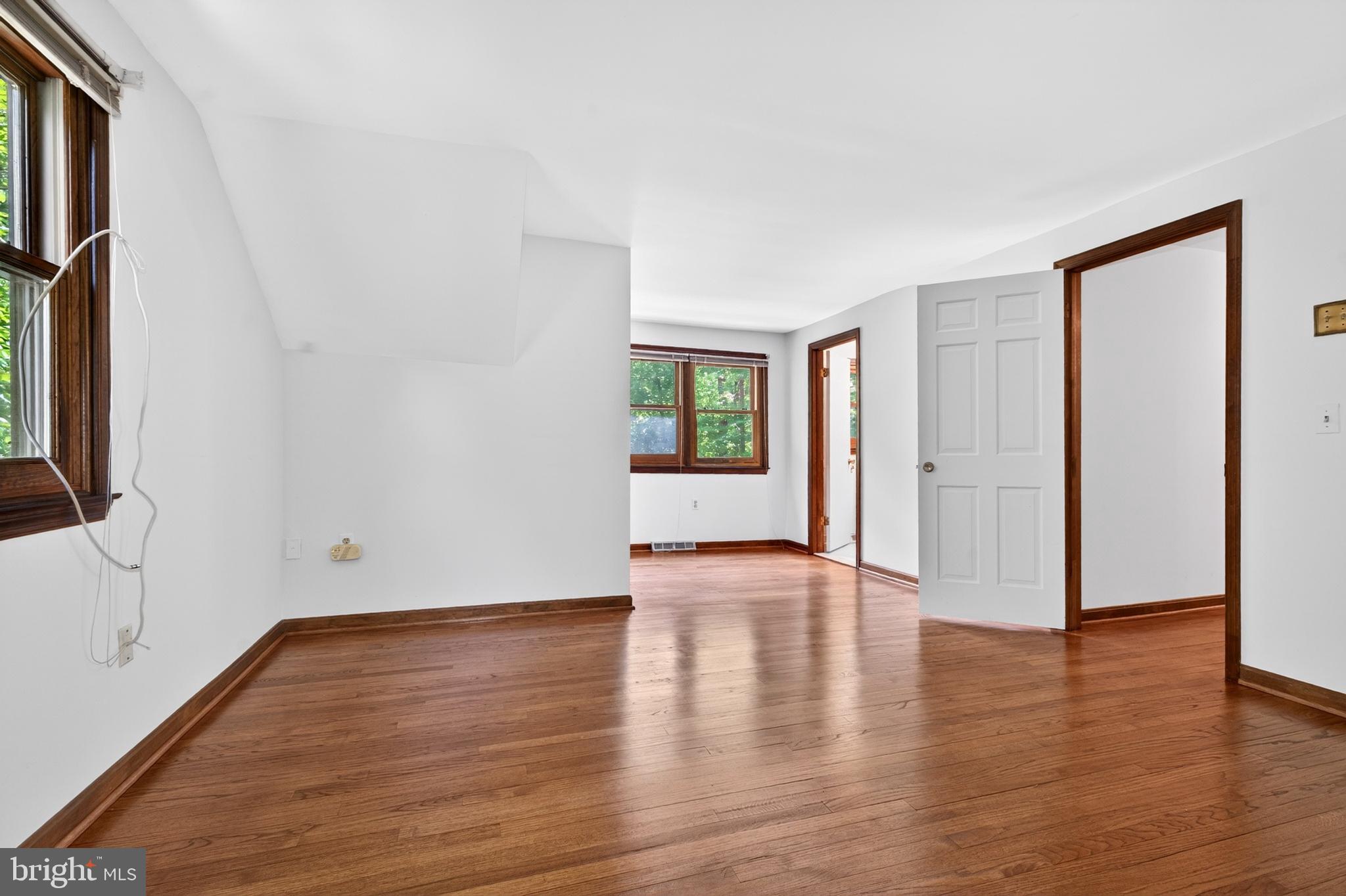 17201 Whiteley Road Monkton, MD 21111 - Photo 24 of 47 a view of an empty room with wooden floor and a window