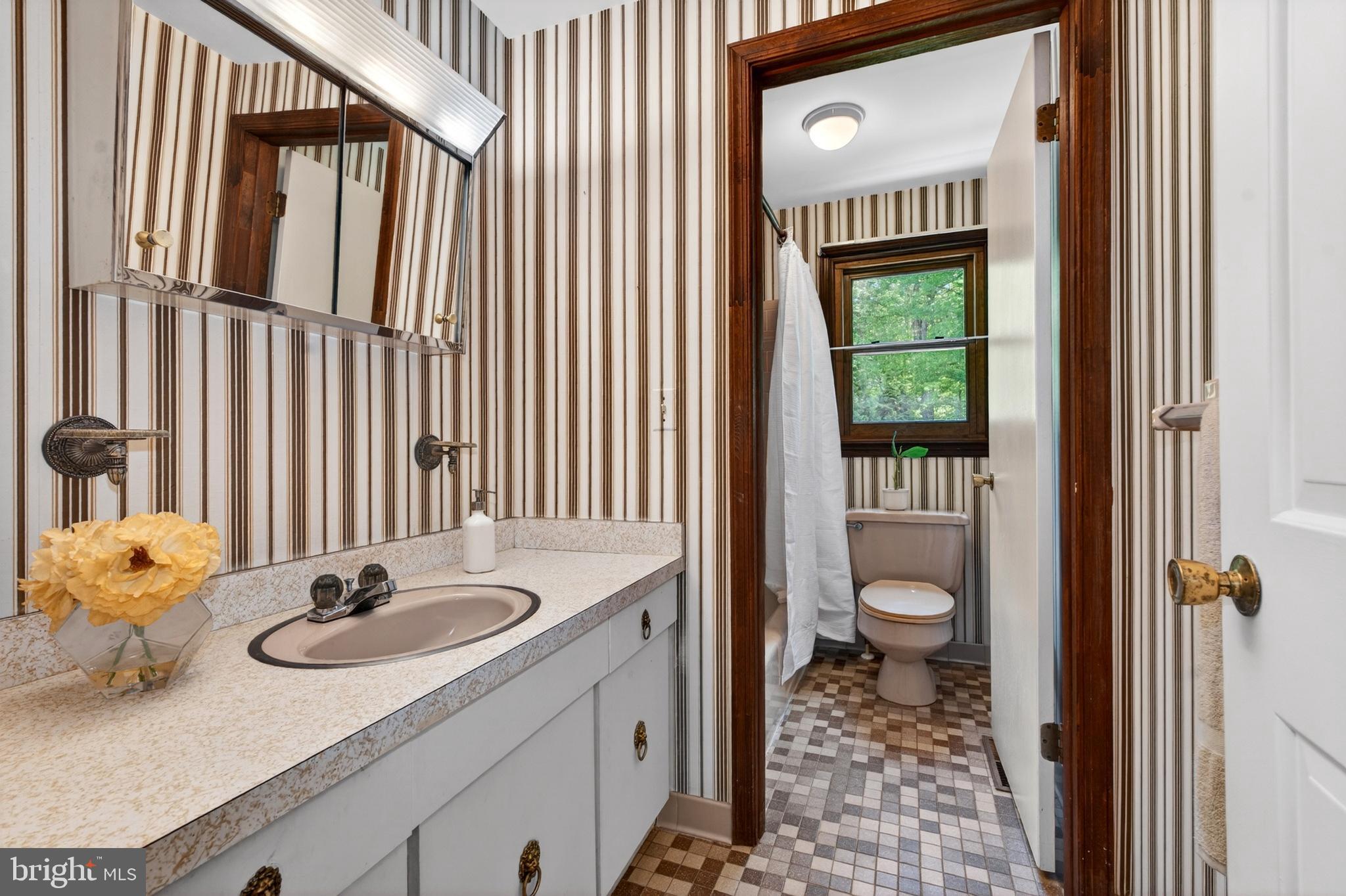 17201 Whiteley Road Monkton, MD 21111 - Photo 27 of 47 a bathroom with a granite countertop sink and a mirror