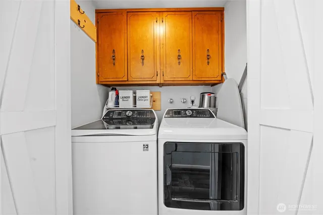 a bedroom with a bed and a cabinets