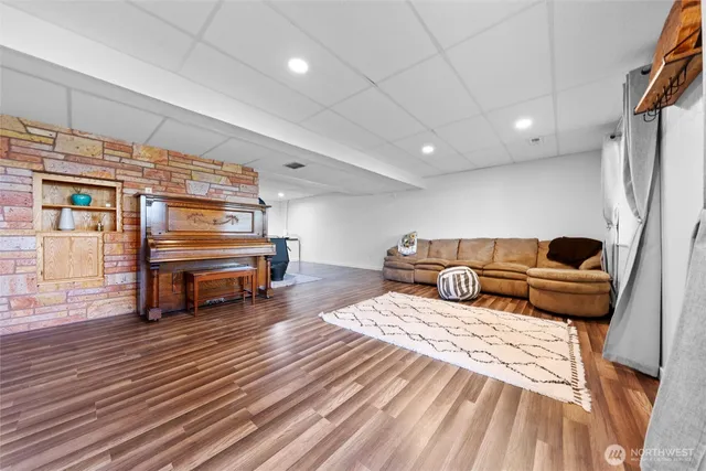 a bedroom with furniture and a fireplace