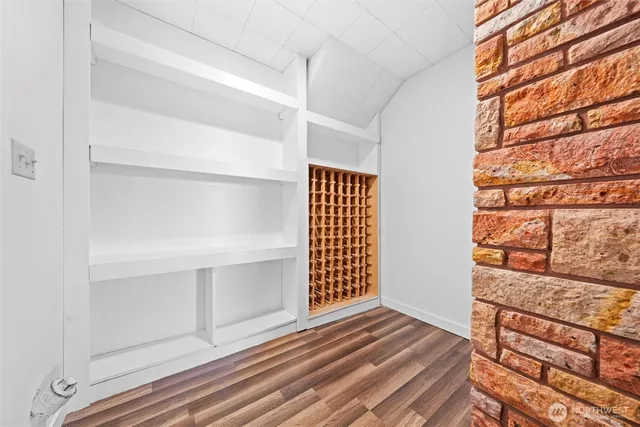 a bathroom with a sink toilet and a mirror