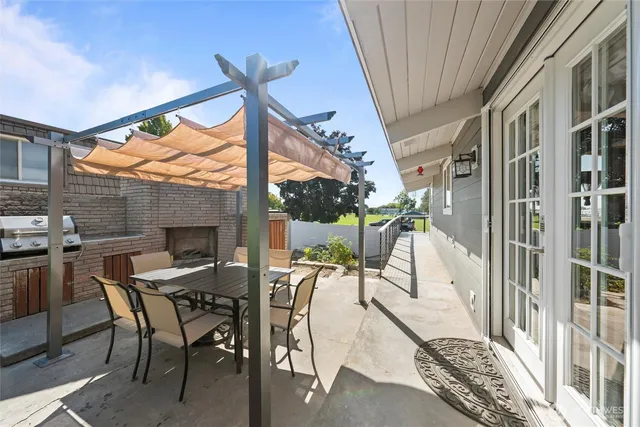 a view of a balcony with chairs