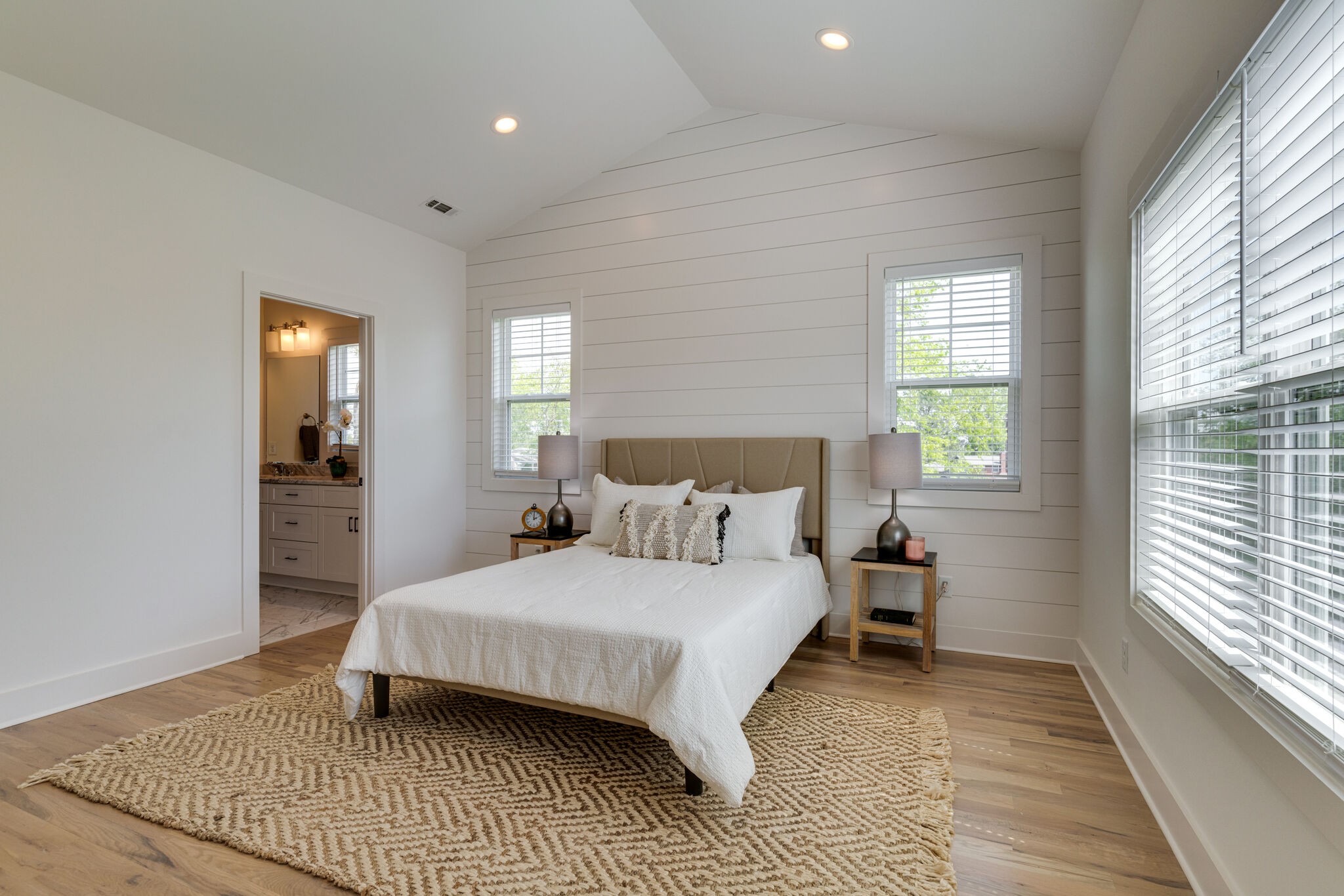 1205 Apache Lane Madison, TN 37115 - Photo 11 of 34 a bedroom with a bed wooden floor and window