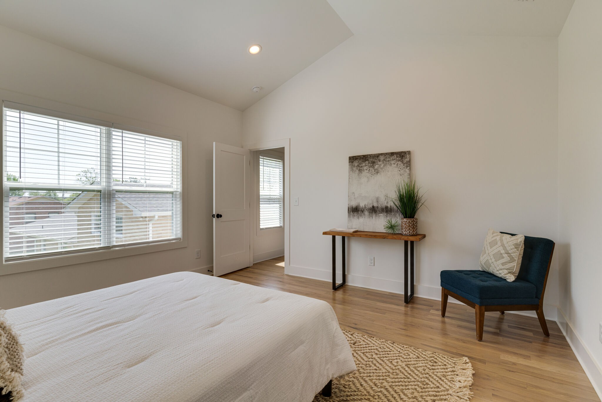 1205 Apache Lane Madison, TN 37115 - Photo 12 of 34 a bedroom with a bed and a table