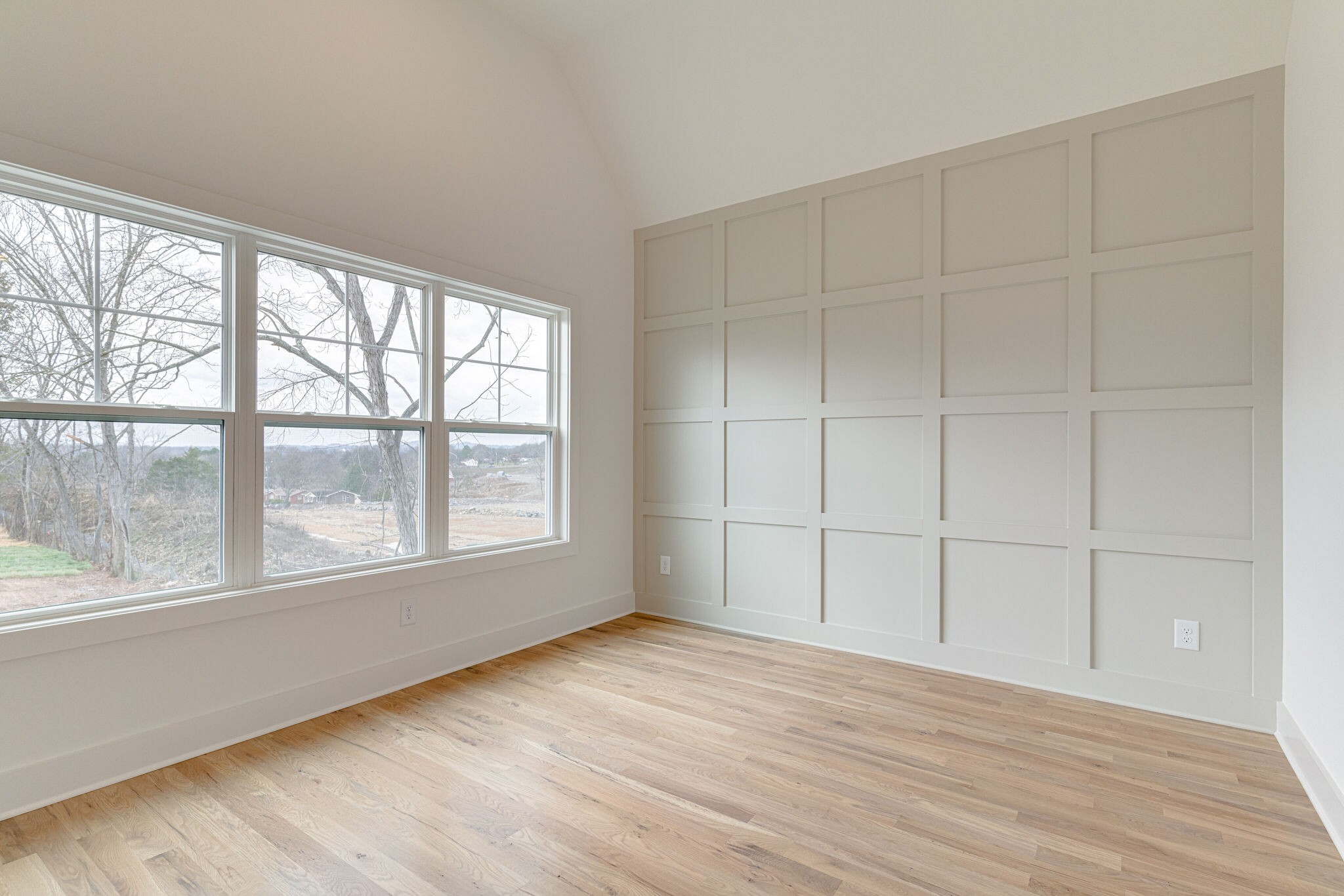 1205 Apache Lane Madison, TN 37115 - Photo 14 of 34 an empty room with wooden floor and windows