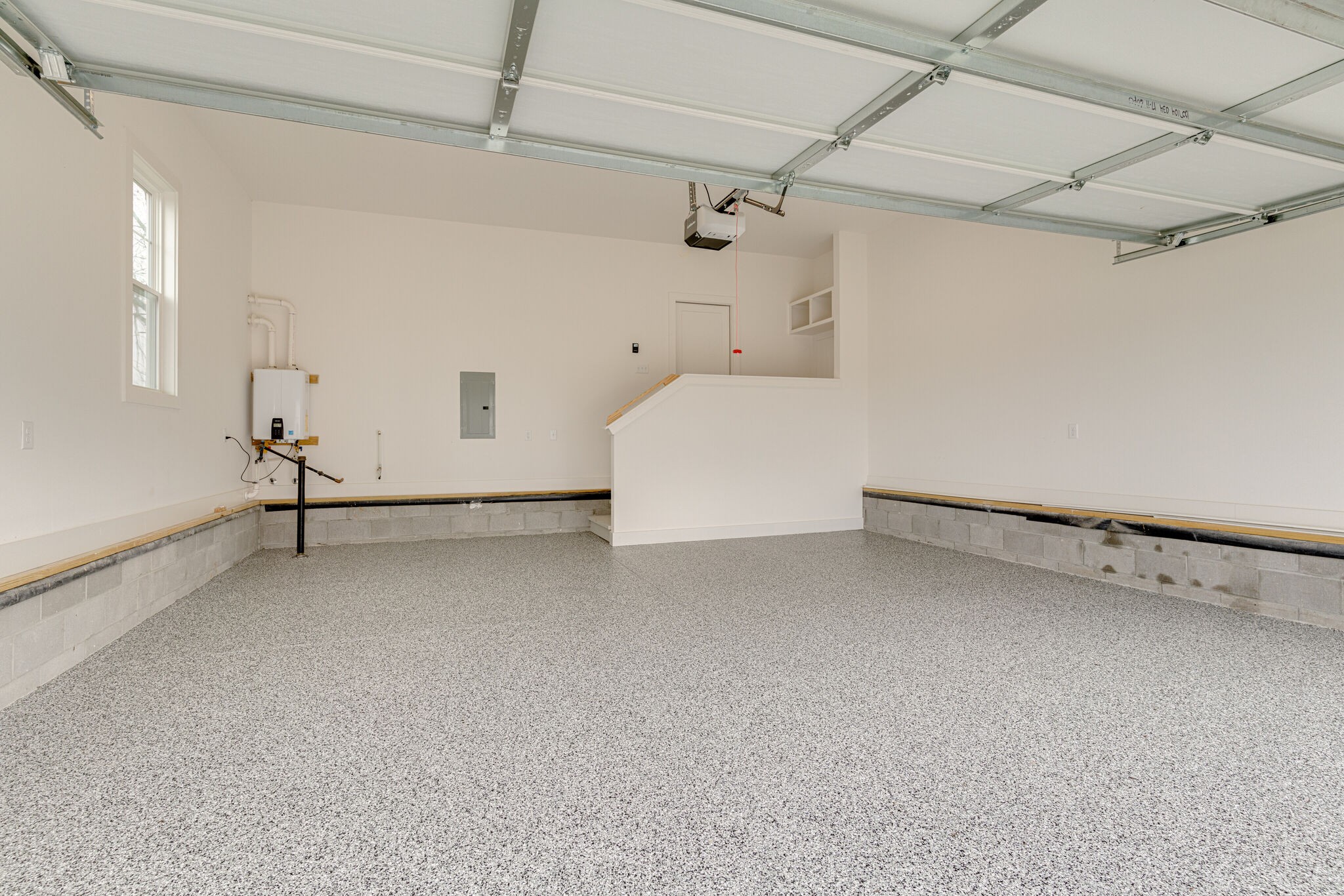 1205 Apache Lane Madison, TN 37115 - Photo 16 of 34 a view of a room with racks on the wall