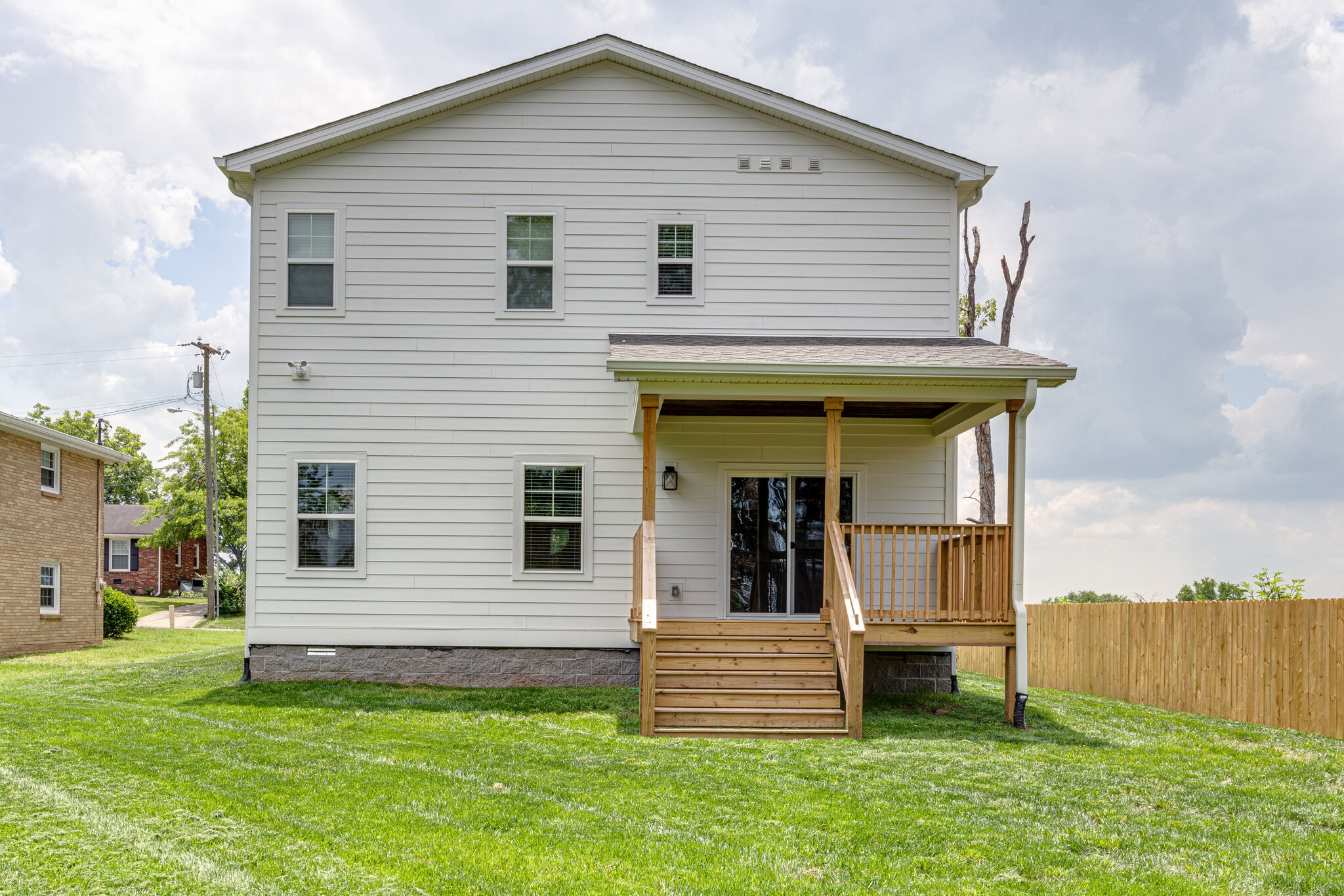 1205 Apache Lane Madison, TN 37115 - Photo 33 of 34 a view of a house with a backyard