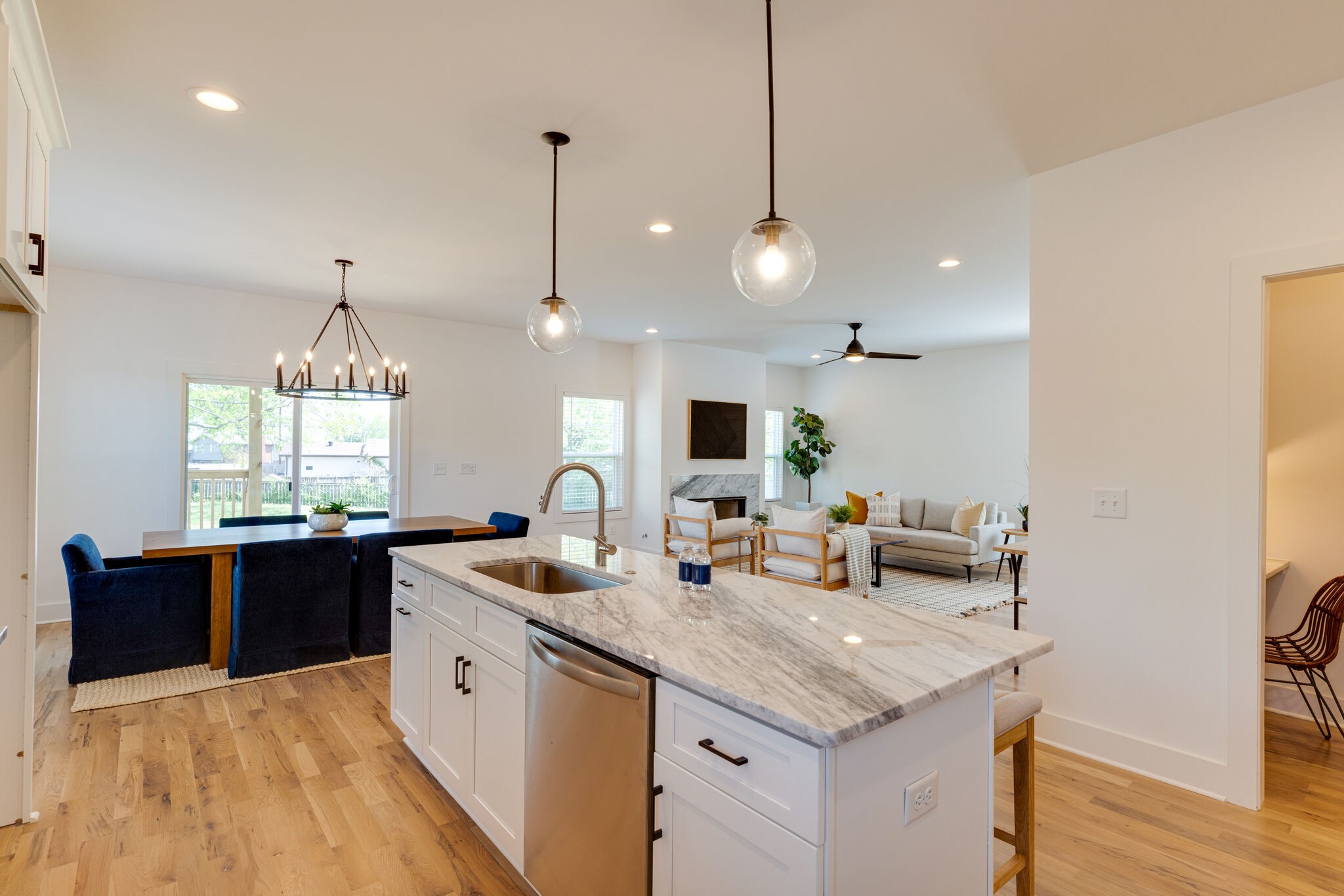 1205 Apache Lane Madison, TN 37115 - Photo 7 of 34 a kitchen with granite countertop a sink stove and wooden floor