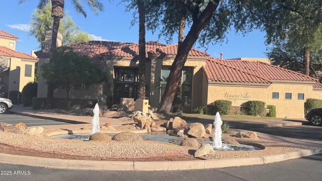 a front view of a house with a porch