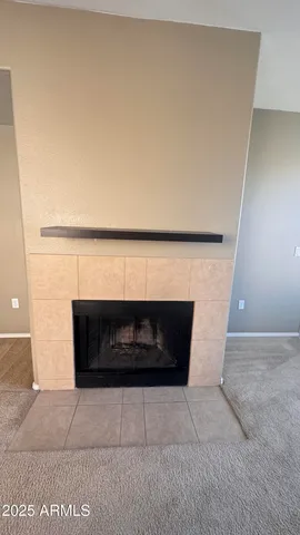 a living room with a fireplace