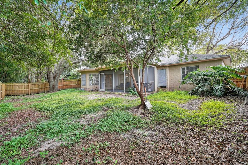 3602 Player Drive New Port Richey, FL 34655 - Photo 35 of 42 a house with green field in front of it