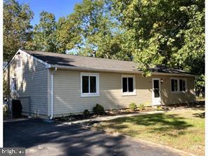 130 Clubhouse Road Browns Mills, NJ 08015 - Photo 1 of 1 a view of a house with a yard
